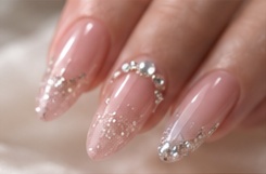 Illustrative AI manicure — blush crystal