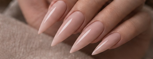 AI inspiration: plain nude nails with a sculpted stiletto shape